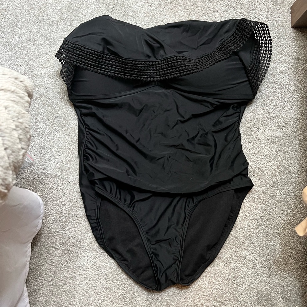 Never Worn. One piece, strapless swimsuit.